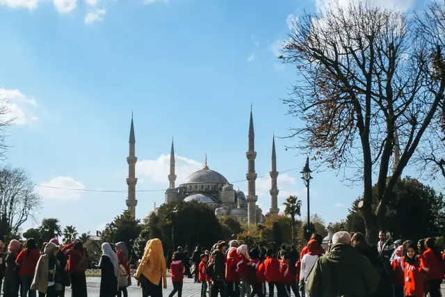 Visitors in front of the Blue Mosque in Istanbul