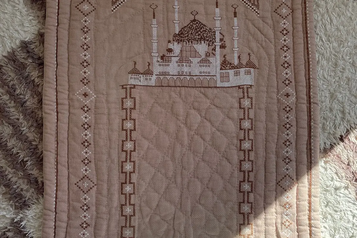 A folded prayer mat