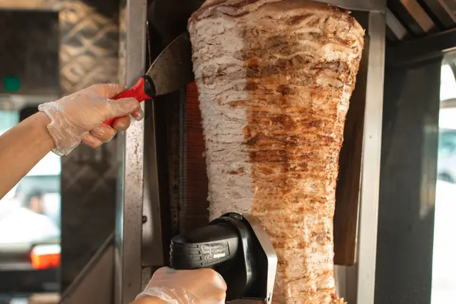 A shawarma wrap being prepared