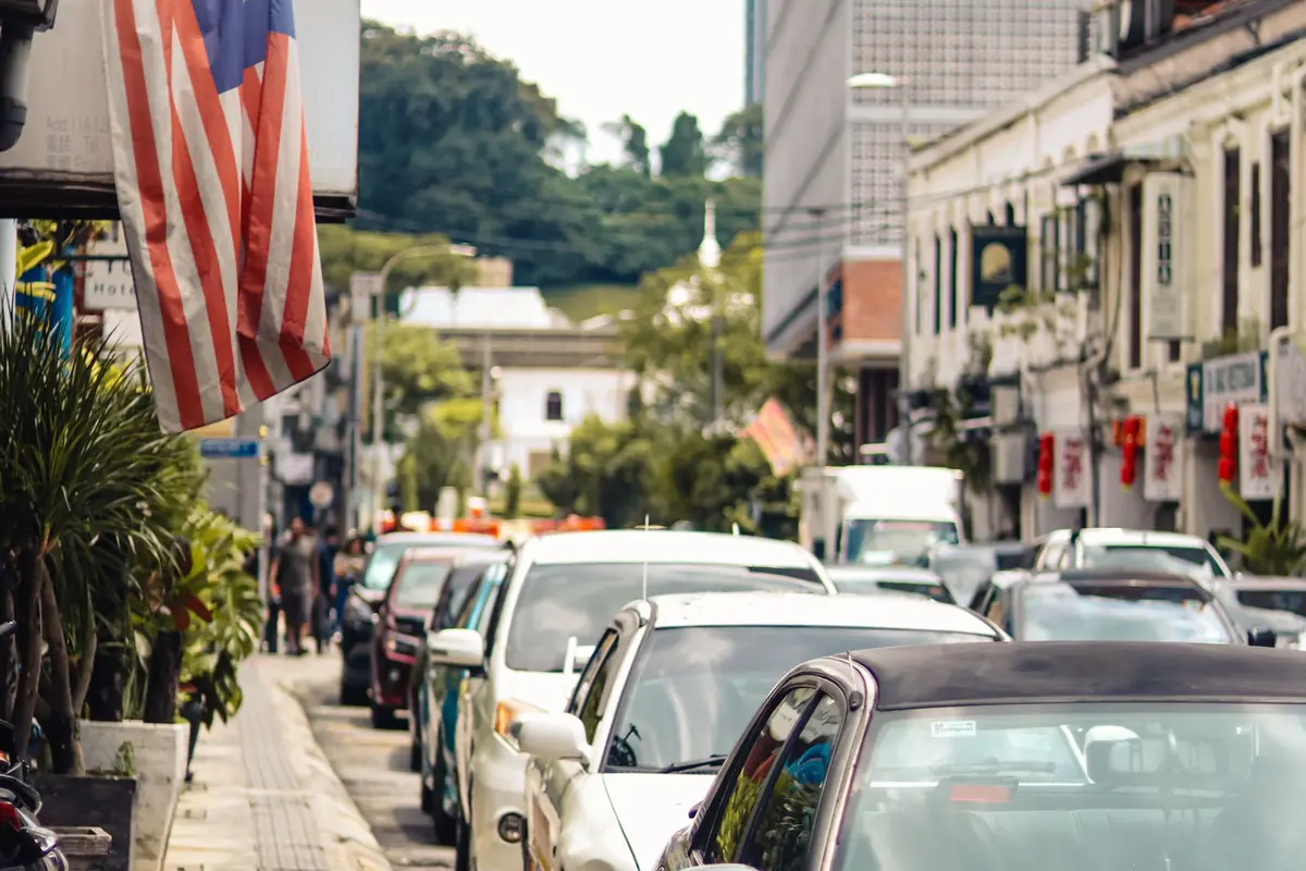 A busy Kuala Lumpur street lined with shops