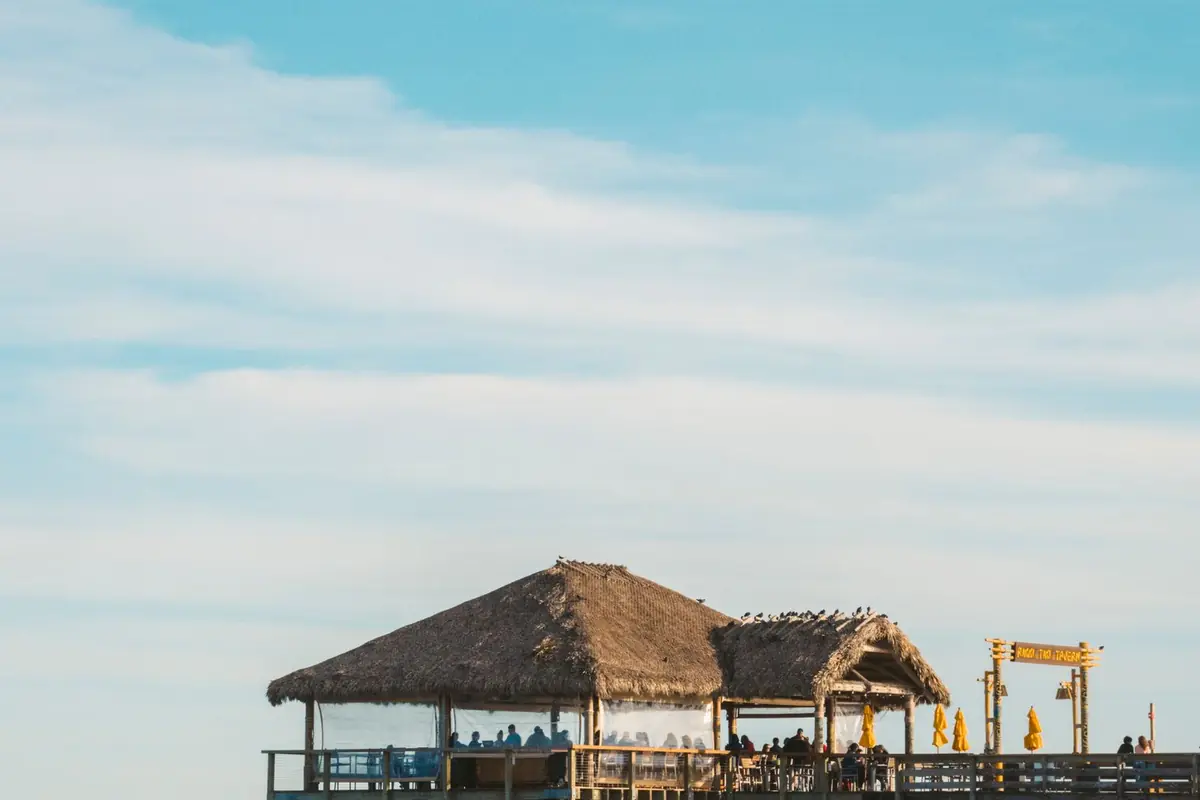 A thatched beach hut on the sand