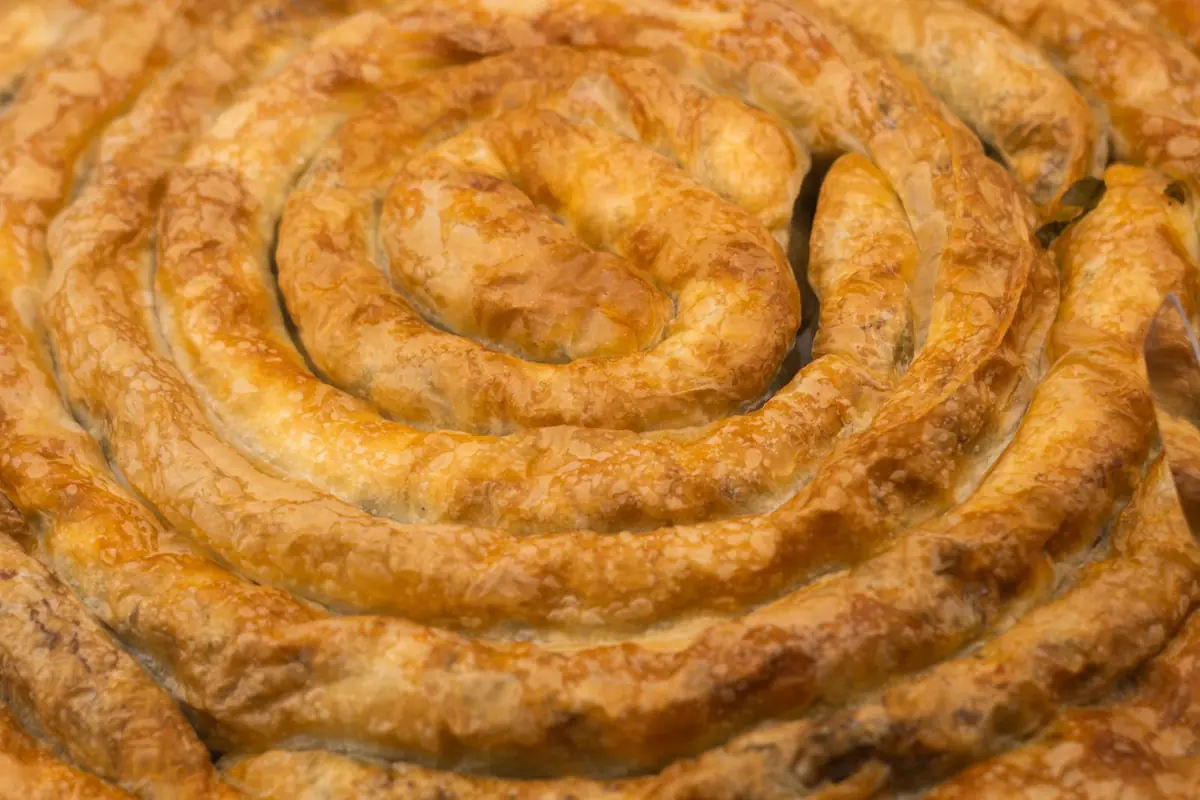 A freshly baked spiral burek pie