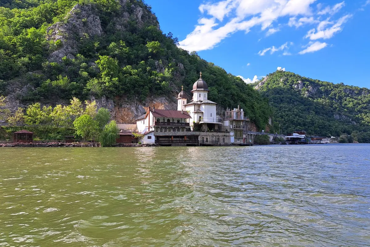 A small monastery on the banks of the Danube in a rocky gorge